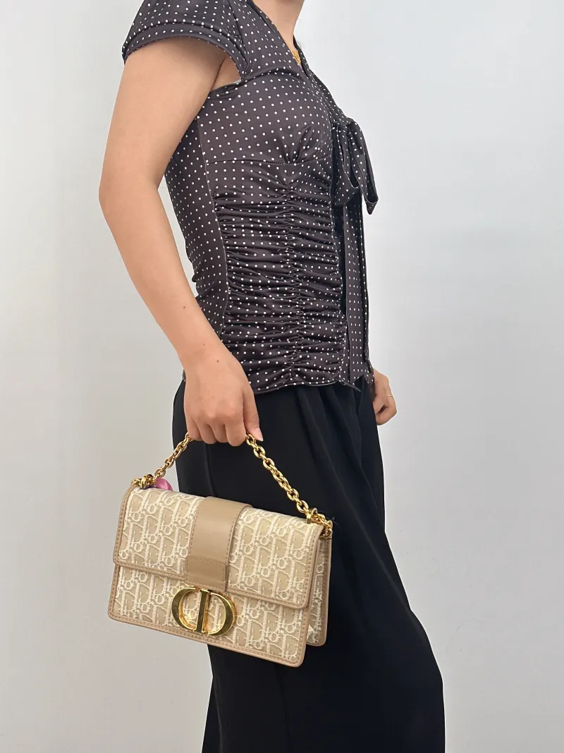 DIOR Crossbody Bag30Montaigne 30Beige Canvas Medium25 × 9 × 16.5 cm — on-model view 1 of 3