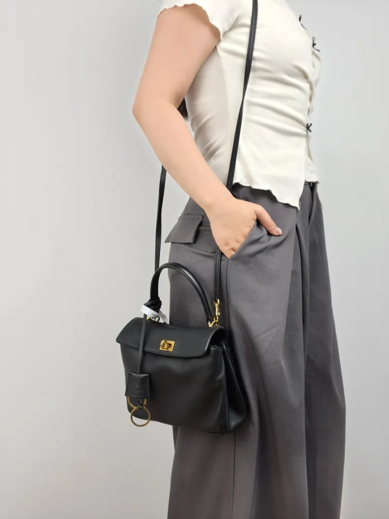BALENCIAGA Crossbody Bag RODEO Black CC alfskin Mini 23 × 10 × 17 cm — on-model view 3 of 3