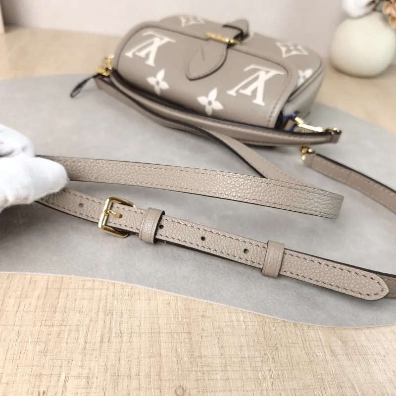 Louis Vuitton Crossbody Bag Diane Baguette Bag Empreinte Embossed Calfskin nano 19 × 6 × 10.5 cm — detail view 9 of 14