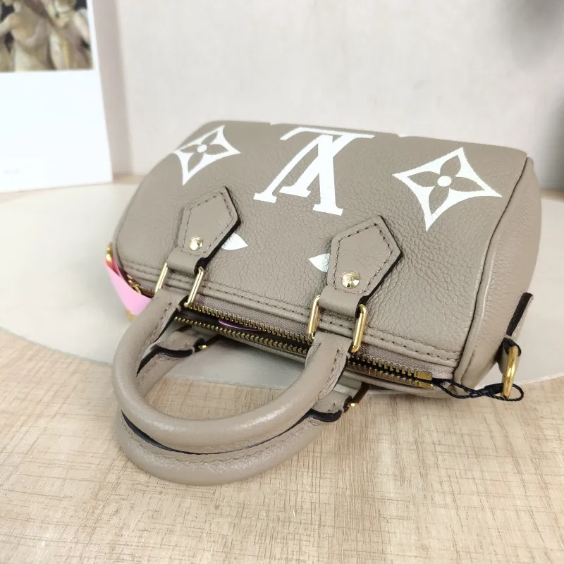 Louis Vuitton Crossbody Bag Speedy Nano · White Empreinte Embossed Calfskin nano 16 × 7.5 × 10 cm — detail view 3 of 11