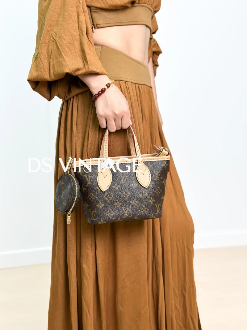 Louis Vuitton Crossbody Bag Neverfull BB Shoulder Strap PVC BB 24 × 9 × 14.5 cm — on-model view 1 of 3