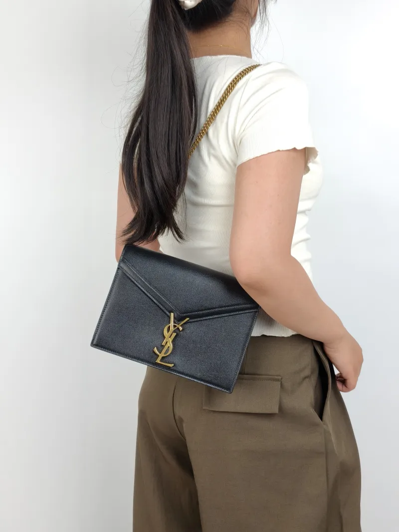 SAINT LAURENT Crossbody Bag Cassandra Black Grained Calfskin Medium 22 × 5.5 × 16.5 cm — on-model view 2 of 3