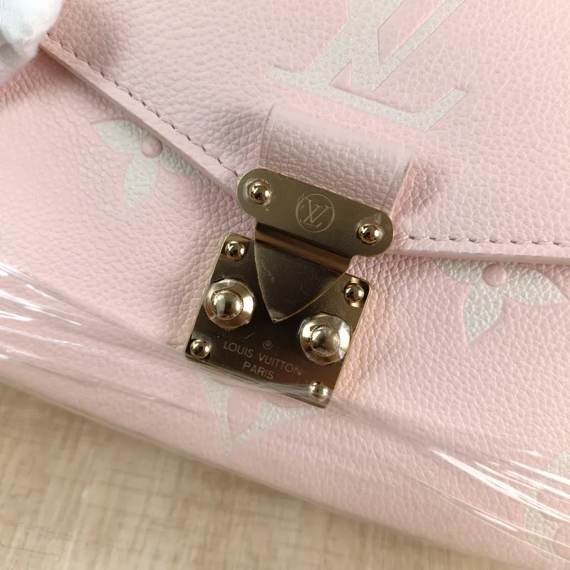Louis Vuitton Crossbody Bag Pochette Métis East West Monogram Empreinte Embossed Calfskin Small 21.5 × 6 × 13.5 cm — detail view 10 of 12