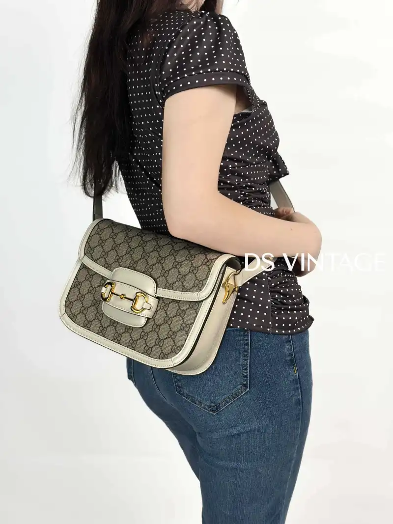 GUCCI Crossbody Bag Horsebit 1955 Horsebit Small White Monogram PVC Small 20.5 × 5 × 14.5 cm — on-model view 1 of 3
