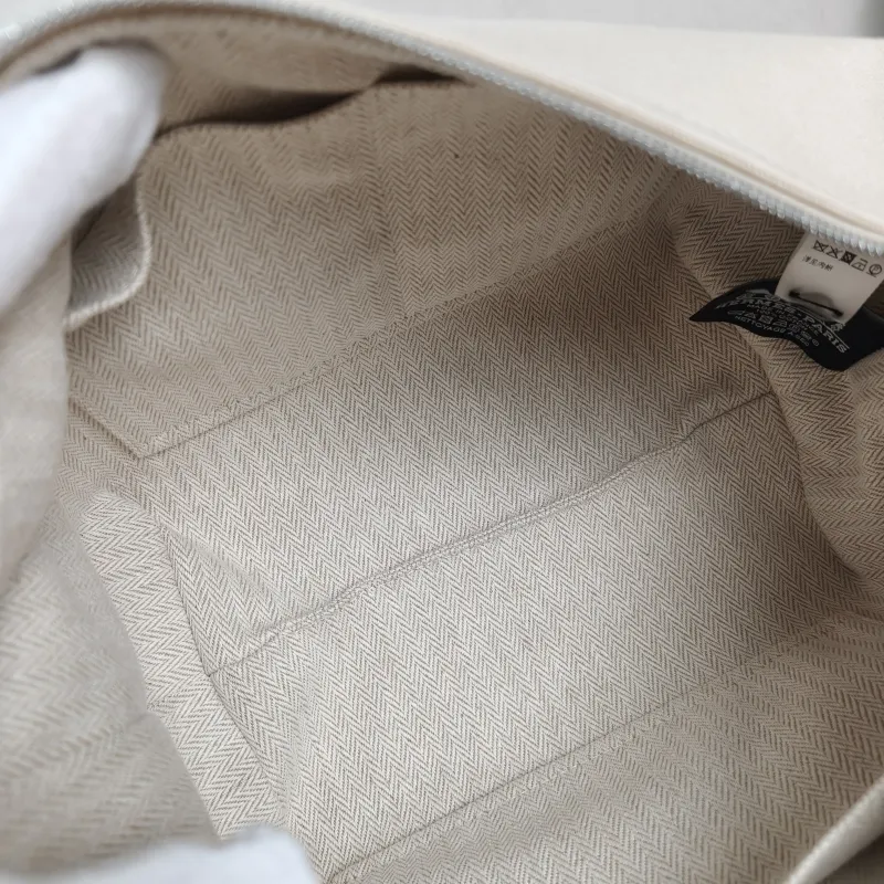 Hermès Top Handle Bagbride-a-brac White Canvas Small21 × 12 × 27 cm — detail view 1 of 11