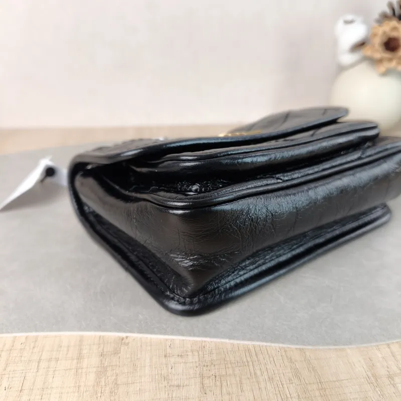 SAINT LAURENT Crossbody Bag Niki Black Waxed Leather Calfskin Mini 18 × 5 × 12.5 cm — detail view 9 of 13