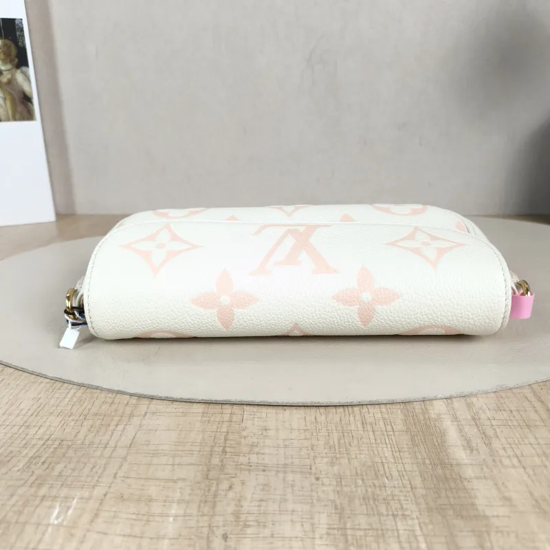 Louis Vuitton Crossbody Bag IVY White · Pink Empreinte Embossed Calfskin Small 23.5 × 4.3 × 12 cm — detail view 5 of 12