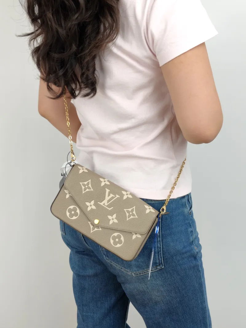 Louis Vuitton Crossbody Bag Pochette Félicie · White Calfskin Small 21 × 3 × 12 cm — on-model view 1 of 2