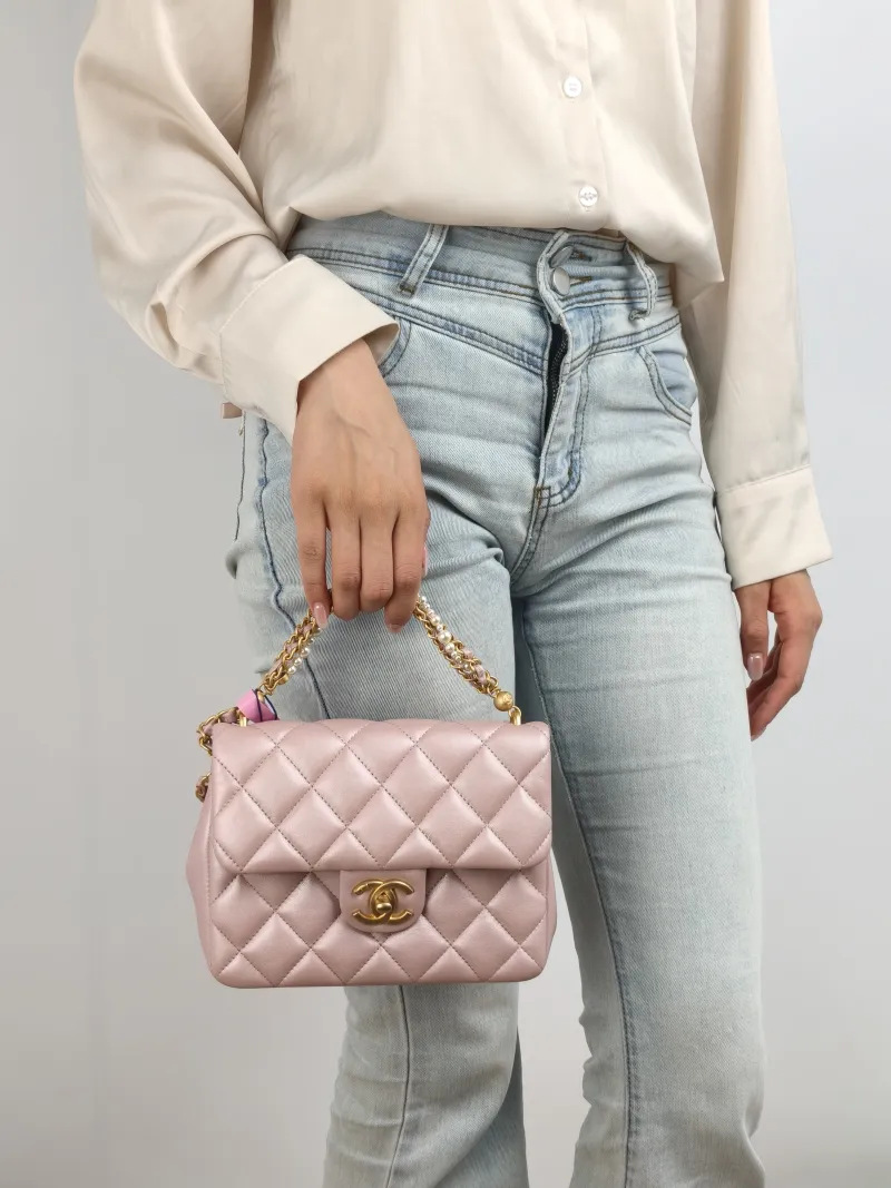 Chanel Crossbody Bag Pearl Lambskin One Size 19.5 × 7.5 × 14.5 cm — on-model view 1 of 2