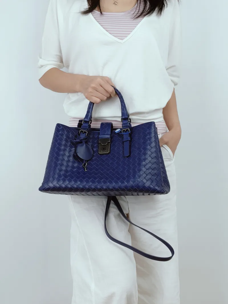 Bottega Veneta Top Handle Bag Roma Calfskin One Size31 × 15 × 20 cm — on-model view 3 of 3