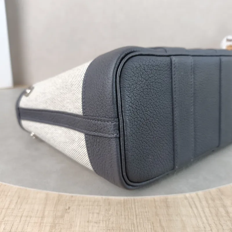 Hermès Top Handle Bag Neo Garden 23 Mini Beige · Canvas · Negonda Calfskinmini23 × 10 × 16 cm — detail view 1 of 11