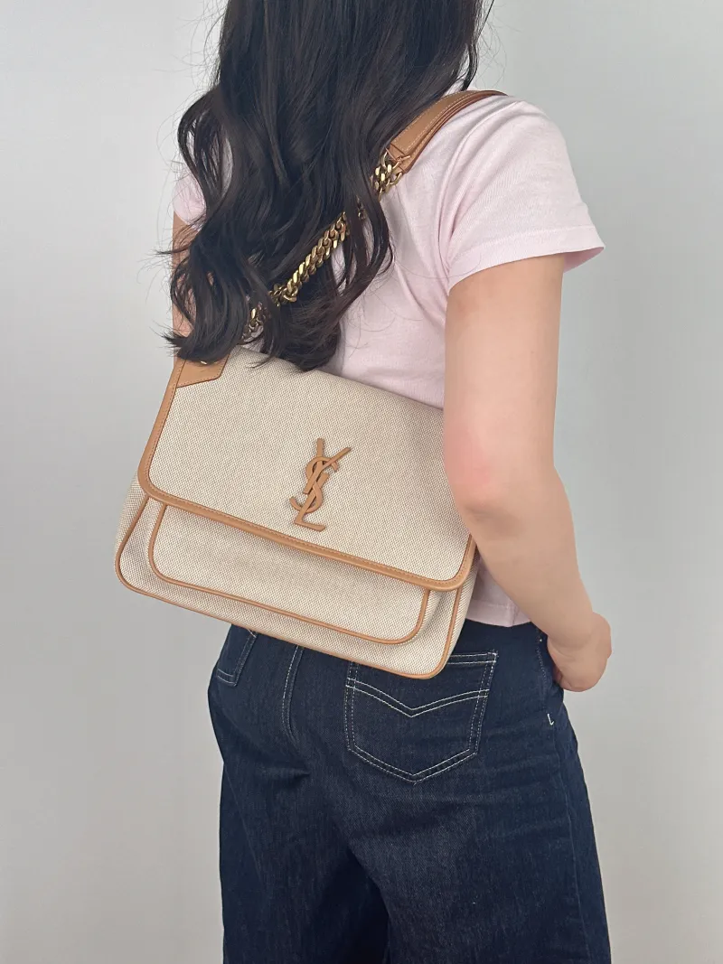 SAINT LAURENT Crossbody Bag Niki D Beige Brown Canvas Medium 28 × 8.5 × 20 cm — on-model view 1 of 2