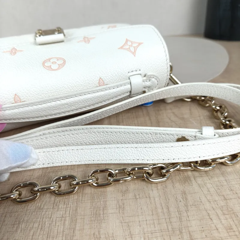 Louis Vuitton Crossbody Bag Pochette Métis East West White · Pink Monogram Empreinte Embossed Calfskin Small21.5 × 6 × 13.5 cm — detail view 5 of 13