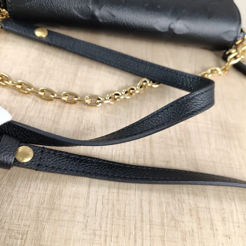 Louis Vuitton Crossbody Bag IVY Black Empreinte Embossed Calfskin Small 23.5 × 4.3 × 12 cm — detail view 2 of 13