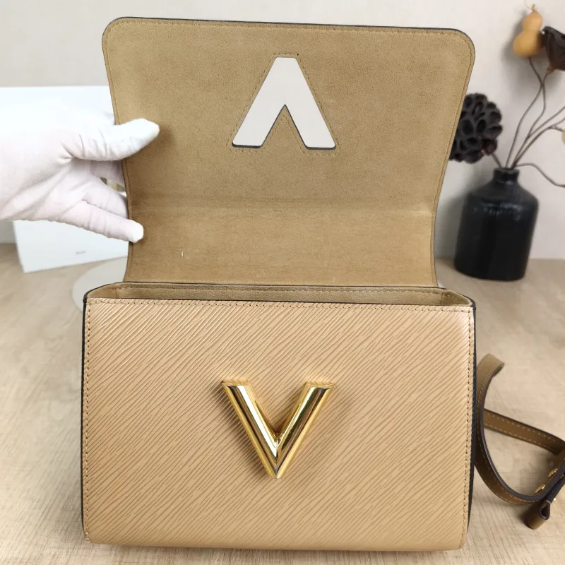 Louis Vuitton Crossbody Bag Twist Taupe Epi Embossed Calfskin Medium 23 × 9.5 × 17 cm — detail view 12 of 13