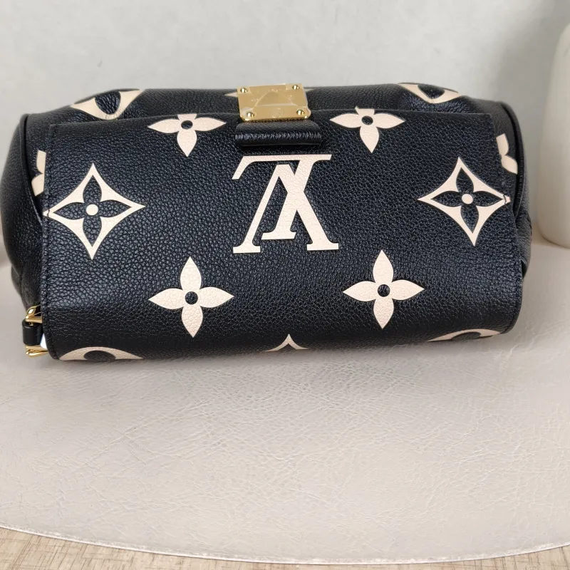 Louis Vuitton Crossbody Bag Favorite Black · White Empreinte Embossed Calfskin Medium 24 × 9 × 14 cm — detail view 12 of 12