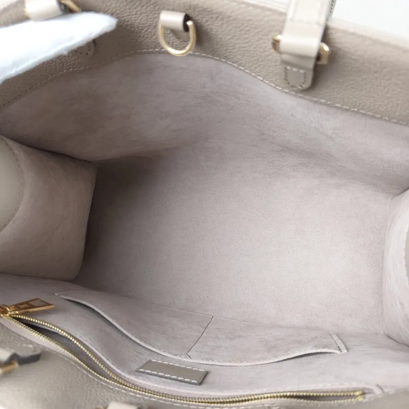 Louis Vuitton Shoulder Bag Onthego Medium Monogram Empreinte Embossed Calfskin Medium 35 × 14 × 27 cm — detail view 6 of 11