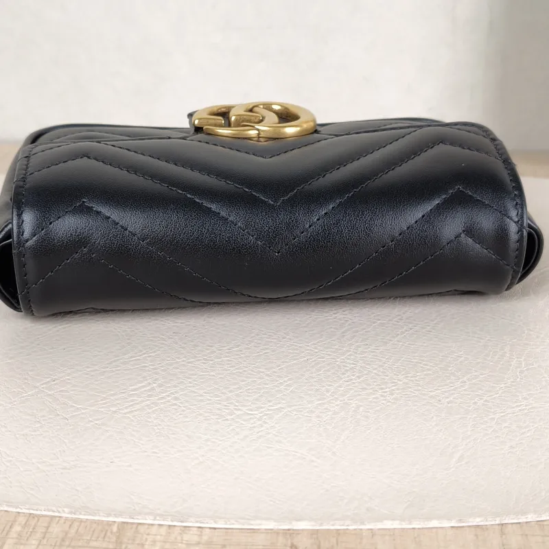 GUCCI Crossbody Bag GG Marmont Mini Marmont Mini Black with Gold-Tone Hardware Calfskinmini16.5 × 4.5 × 9.5 cm — detail view 2 of 13