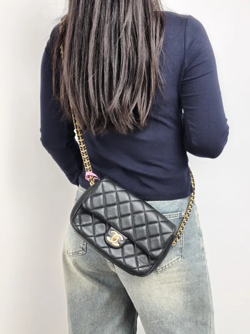 Chanel Crossbody Bag Black Grained Calfskin 20 × 7 × 15 cm — on-model view 1 of 2