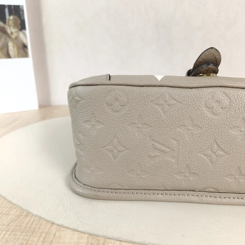 Louis Vuitton Crossbody Bag Diane Baguette Bag Monogram Empreinte Embossed Calfskin Small 24 × 9 × 15 cm — detail view 1 of 13