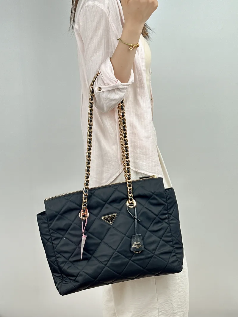 PRADA Shoulder Bag Re-Edition Black Nylon One Size 35 × 9 × 27 cm — on-model view 1 of 2