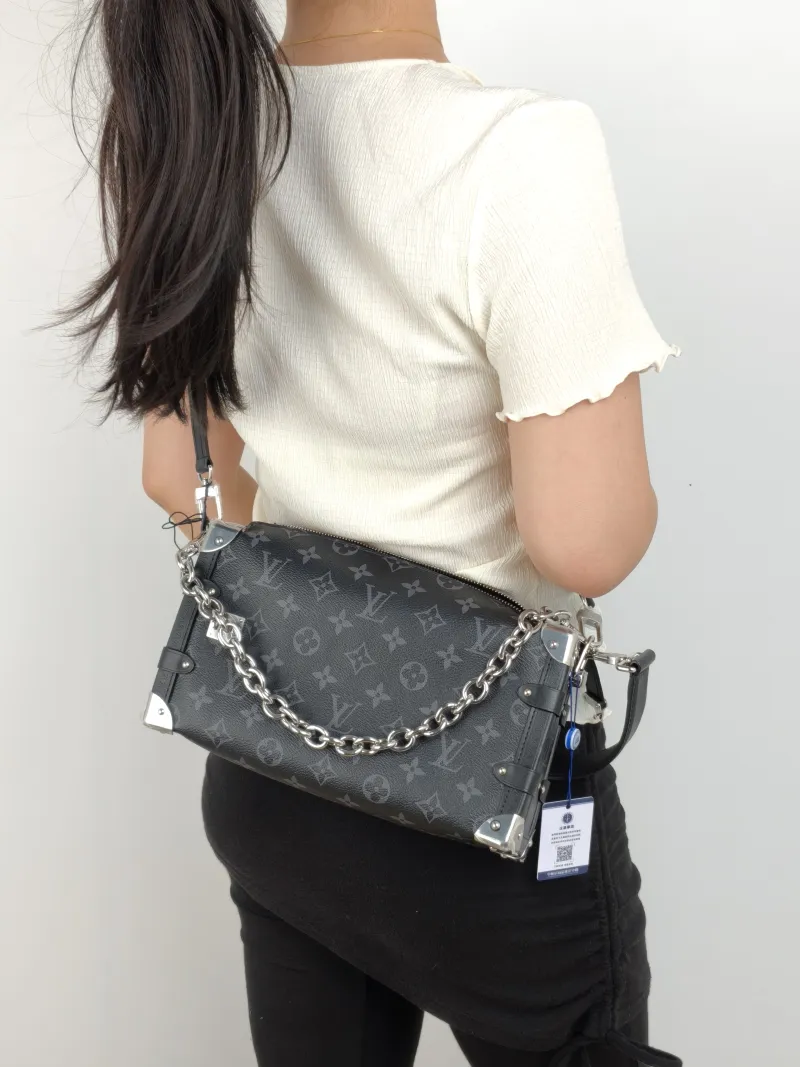 Louis Vuitton Crossbody Bag Side Trunk East West Box Monogram PVC Medium 28 × 7 × 15 cm — on-model view 1 of 3
