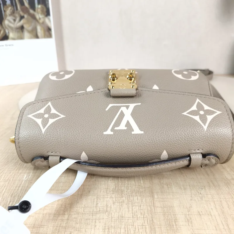 Louis Vuitton Crossbody Bag Pochette Métis East West Monogram Empreinte Embossed Calfskin Small 21.5 × 6 × 13.5 cm — detail view 7 of 12