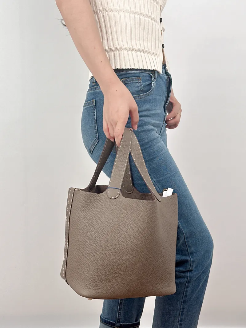 Hermès Top Handle Bag Picotin Lock 22 22 Clemence Taurillon TC Calfskin Medium22 × 18 × 21 cm — on-model view 2 of 2