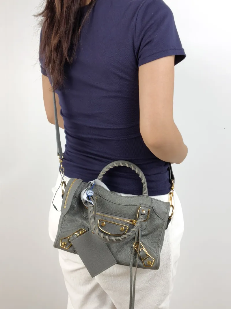 BALENCIAGA Crossbody Bag Classic City Grey Lambskin Mini 24 × 10 × 16 cm — on-model view 1 of 2