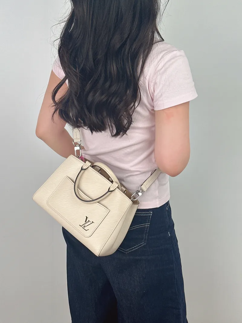 Louis Vuitton Crossbody Bag Marelle Tote Top Handle Bag White Epi Embossed Calfskin BB 25 × 11 × 17 cm — on-model view 2 of 2