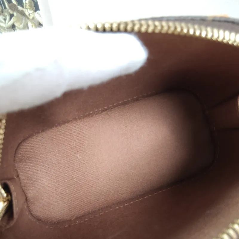 Louis Vuitton Crossbody Bag Alma Nano Monogram PVC nano 18 × 8 × 12 cm — detail view 10 of 10