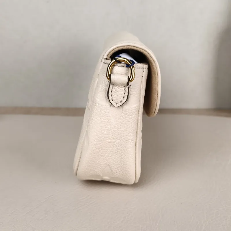 Louis Vuitton Crossbody Bag IVY White Monogram Empreinte Embossed Calfskin Small 23.5 × 4.3 × 12 cm — detail view 7 of 11
