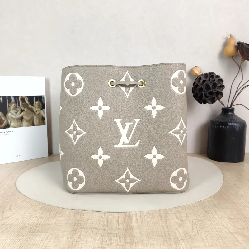 Louis Vuitton Shoulder Bag NÉONOÉ Bucket Bag · White Monogram Empreinte Embossed Calfskin Medium 26 × 17.5 × 26 cm — cover view 2 of 5