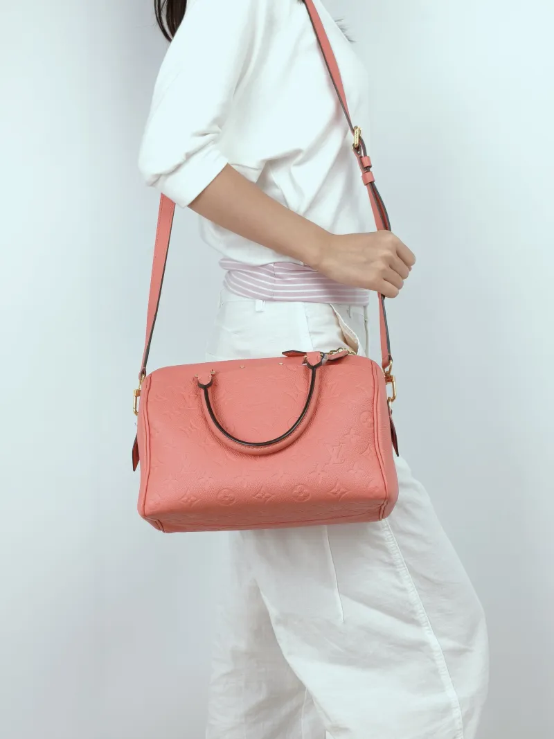Louis Vuitton Top Handle Bag Speedy25 Pink Calfskin Medium25 × 15 × 19 cm — on-model view 1 of 3