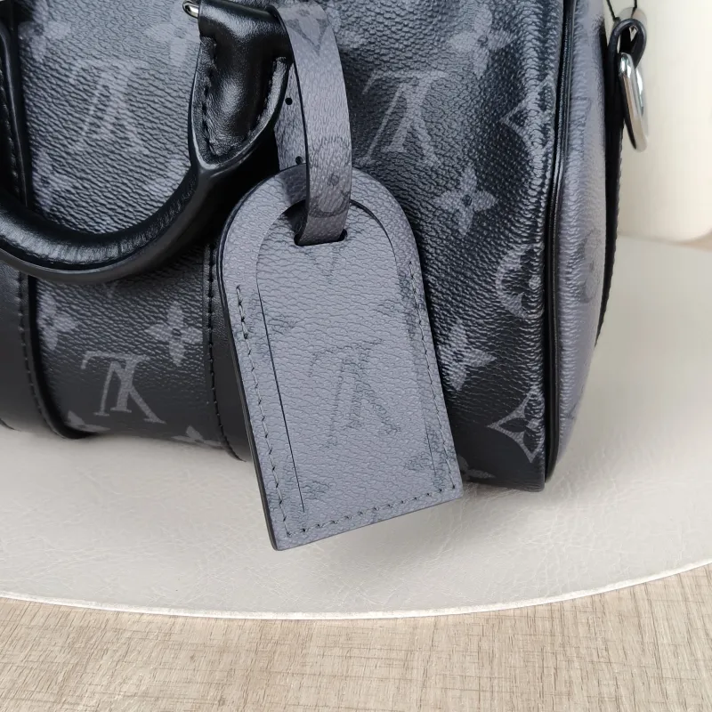 Louis Vuitton Crossbody Bag Keepall 25 PVC Medium 25 × 11 × 15 cm — detail view 8 of 12