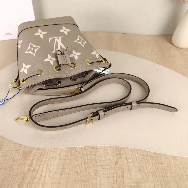 Louis Vuitton Crossbody Bag NANO NOÉ Bucket Bag Nano · White Empreinte Embossed Calfskin Monogramnano13 × 10 × 16 cm — detail view 6 of 11