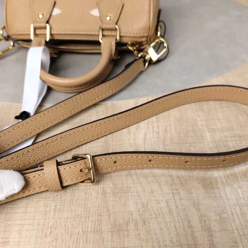 Louis Vuitton Crossbody Bag Speedy Nano · White Empreinte Embossed Calfskinnano16 × 7.5 × 10 cm — detail view 13 of 14