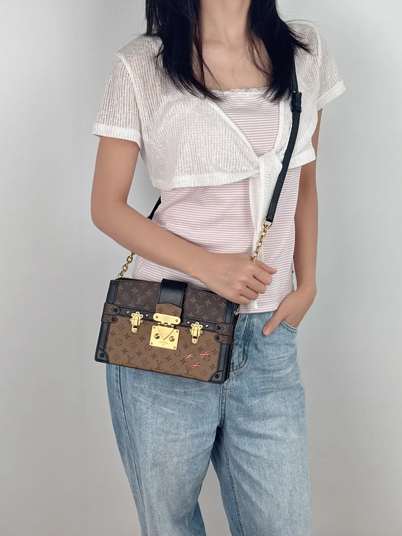 Louis Vuitton Crossbody Bag Trunk Clutch Box Monogram PV Cmini20 × 5.5 × 12 cm — on-model view 1 of 2