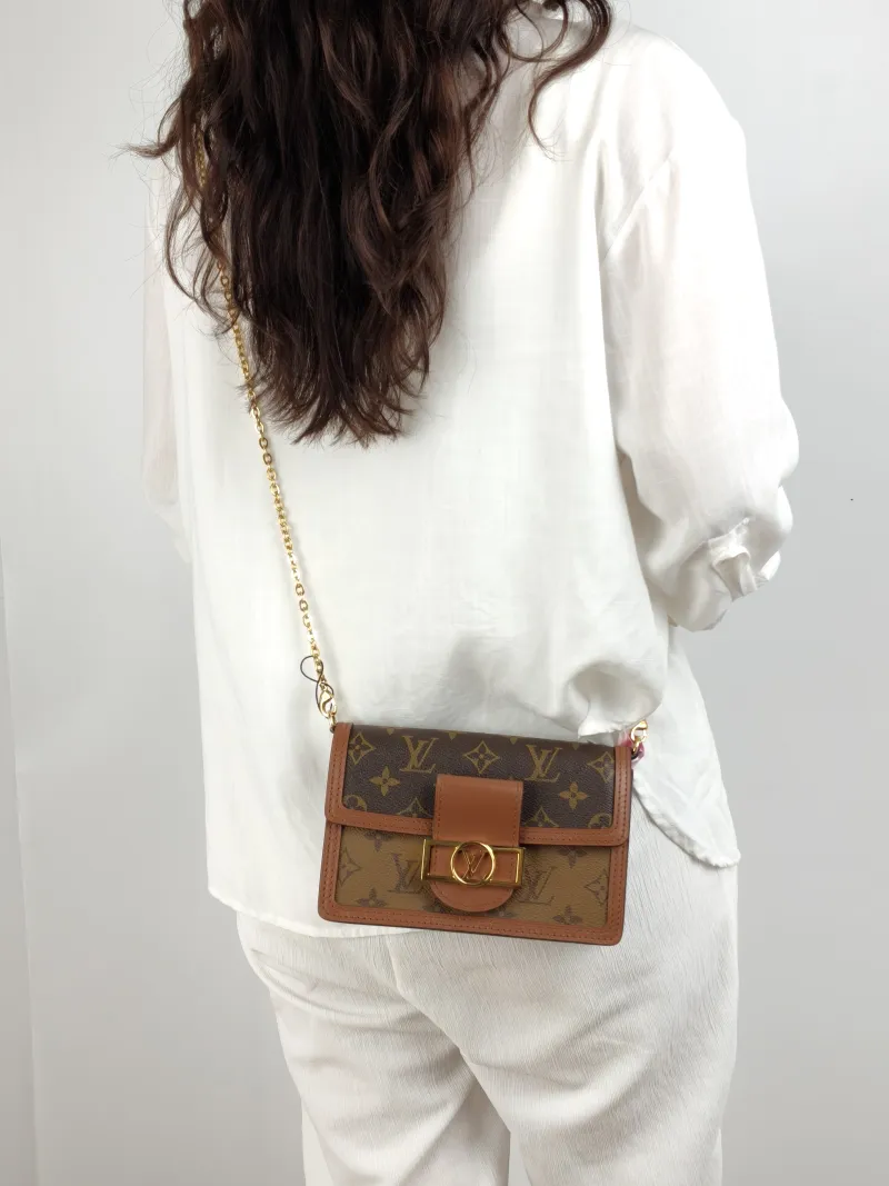 Louis Vuitton Crossbody Bag Dauphine Woc Woc Monogram PVC One Size 18.5 × 5 × 12 cm — on-model view 2 of 2