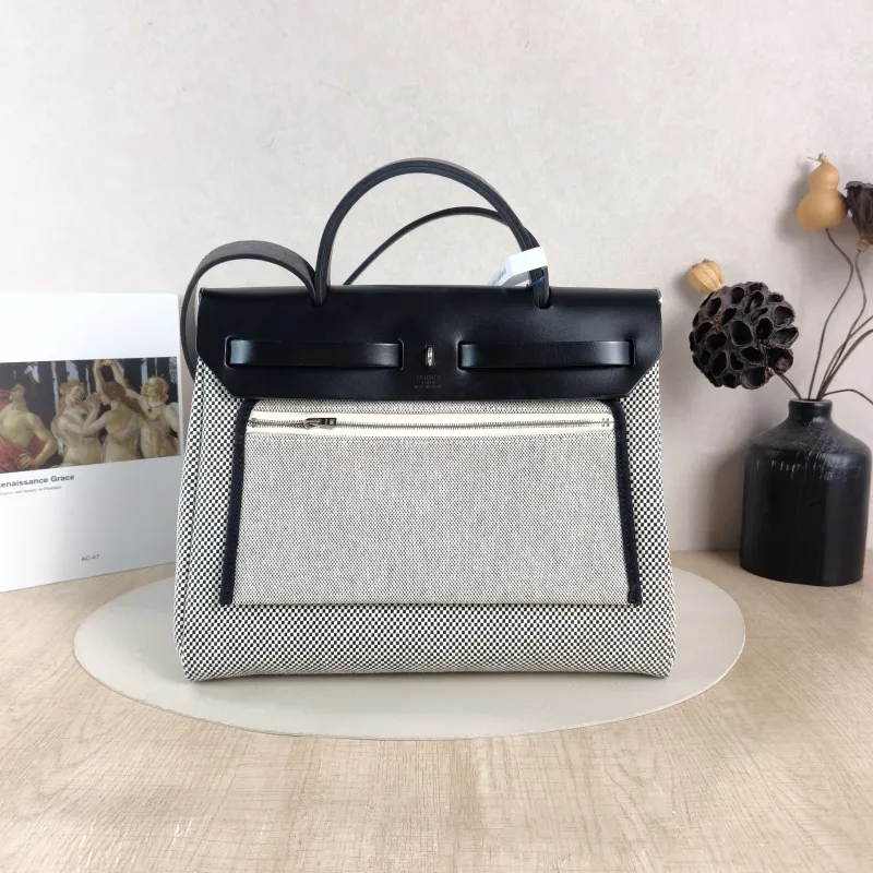 Hermès Crossbody Bag Herbag 31 Black · White Canvas Medium 30.5 × 11 × 25.5 cm u — cover view 4 of 6
