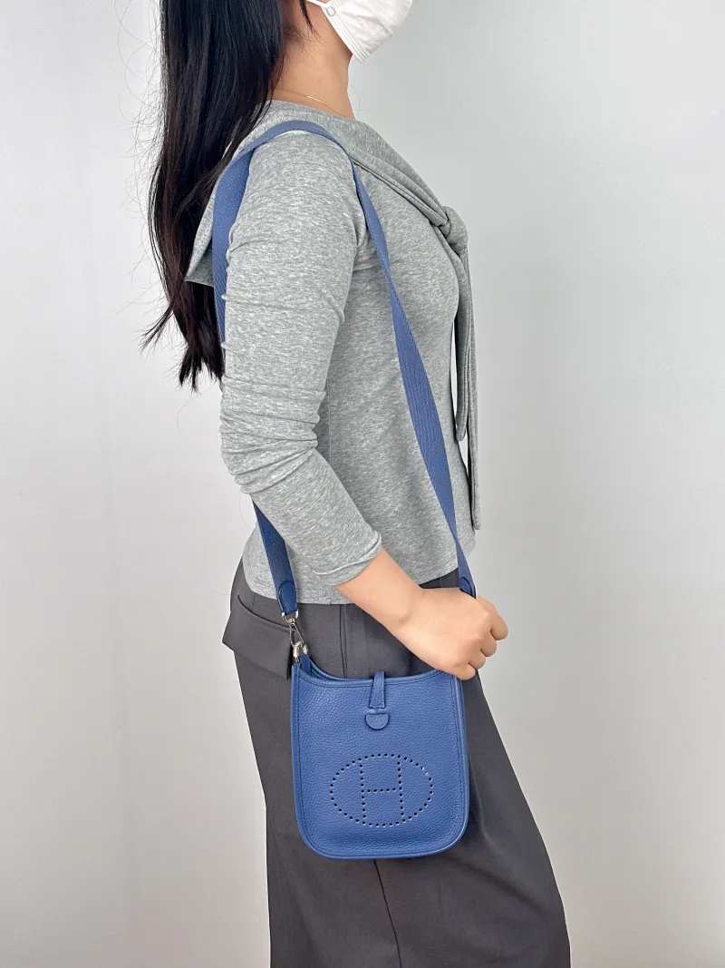 Hermès Crossbody Bag Evelyne Mini 16 Mini 16 Blue TC Calfskin Mini 17 × 5.5 × 18 cm D — on-model view 1 of 2