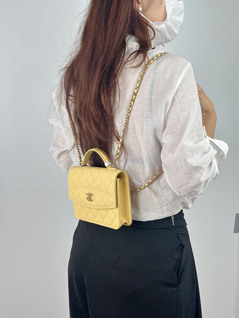 Chanel Backpack Yellow Grained Calfskin One Size 18.2 × 5 × 14 cm — on-model view 1 of 3