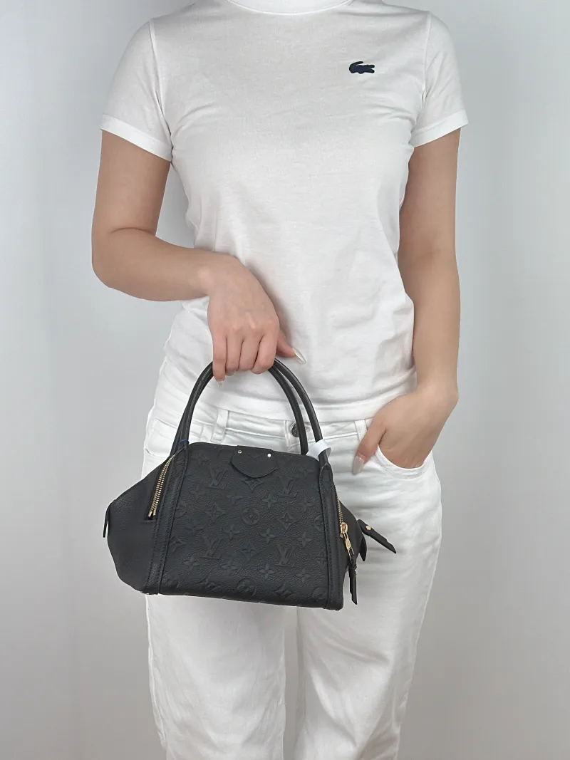 Louis Vuitton Top Handle Bag Top Handle Bag Black Calfskin One Size 21 × 15 × 16 cm — on-model view 2 of 2