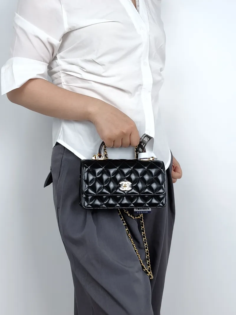 Chanel Crossbody Bag woc Black Waxed Leather One Size19 × 7 × 11 cm — on-model view 1 of 3