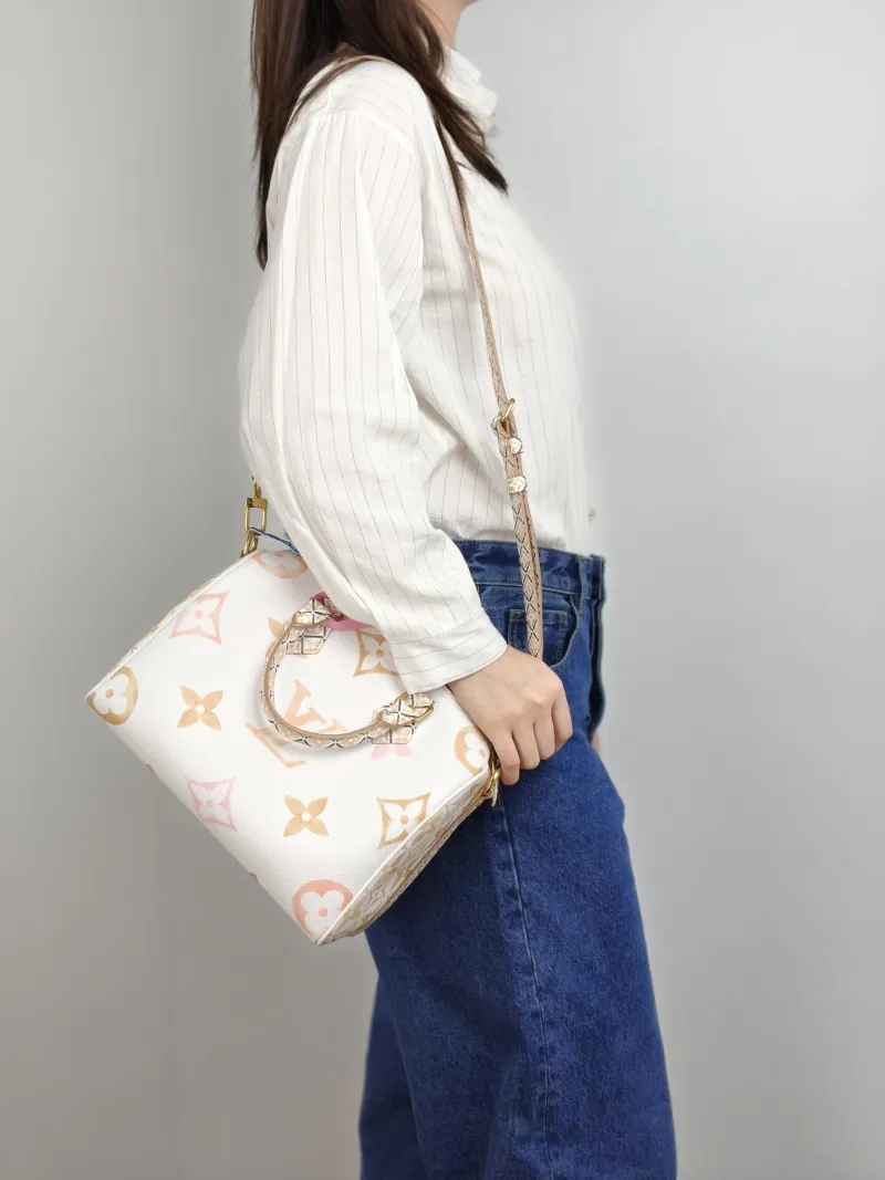 Louis Vuitton Top Handle Bag Speedy25 PVC One Size 25 × 15 × 19 cm — on-model view 2 of 3