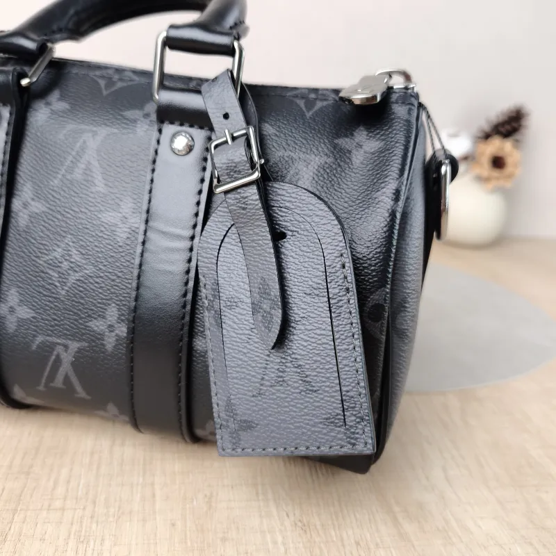 Louis Vuitton Crossbody Bag Keepall 25 PVC Medium 25 × 11 × 15 cm — detail view 7 of 12