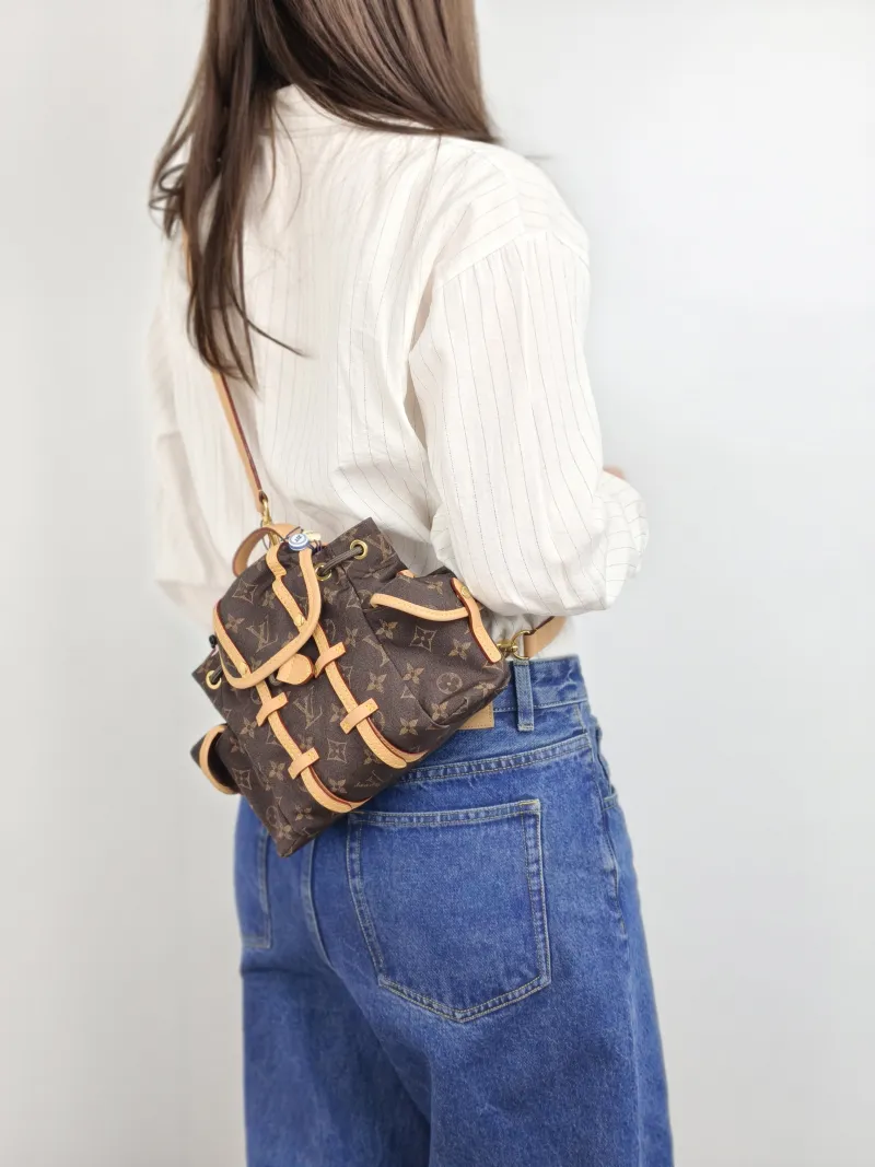 Louis Vuitton Backpack Backpack Monogram Nylon One Size 21 × 8 × 17 cm — on-model view 1 of 2