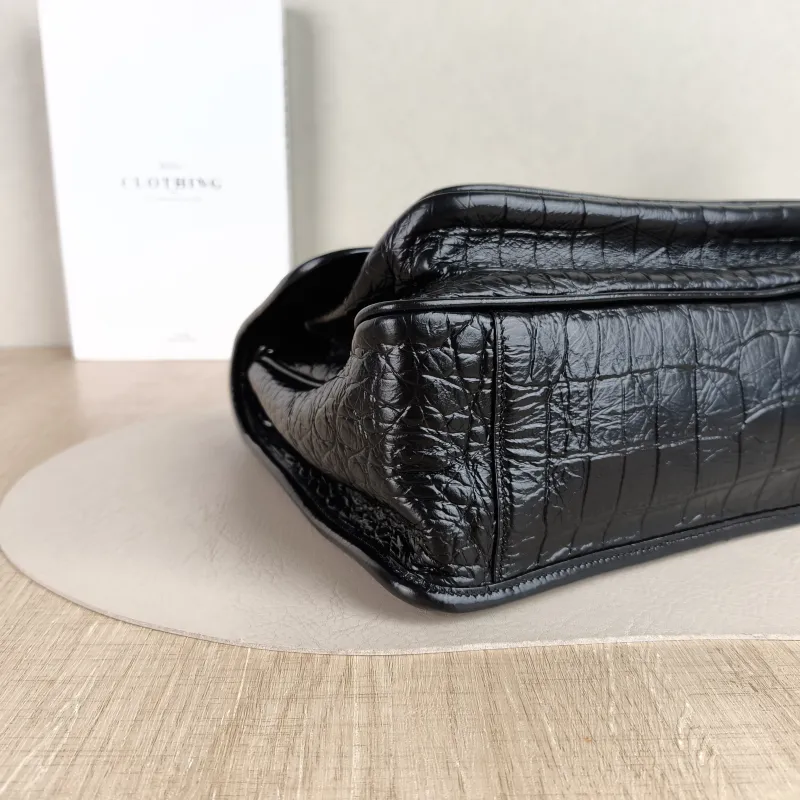 SAINT LAURENT Crossbody Bag Niki Black Waxed Leather Calfskin Medium 28 × 8.5 × 20 cm — detail view 1 of 12
