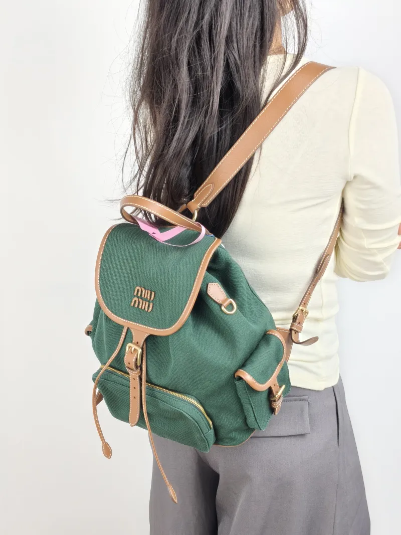 Miumiu Backpack Backpack Green Canvas Large 25 × 12.5 × 29.5 cm — on-model view 2 of 2