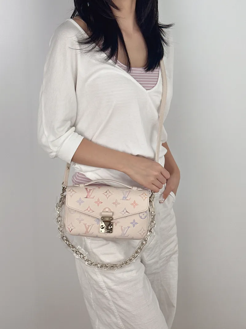 Louis Vuitton Crossbody Bag Pochette Métis East West Empreinte Embossed Calfskin Small 21.5 × 6 × 13.5 cm — on-model view 2 of 4